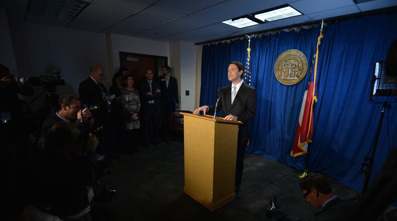 January 14, 2014 Atlanta: Sen. Jason Carter, D-Decatur delivers a response to Gov. Nathan Deal's State of the State speech Wednesday January 15, 2014. Sen. Carter recently announced that he will challenge Gov. Deal in the November election. BRANT SANDERLIN /BSANDERLIN@AJC.COM