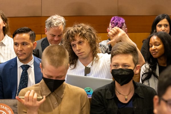 James Marsicano, making a thumbs down gesture, is one defendant in a RICO case involving Atlanta’s public safety training center. (Arvin Temkar/AJC)