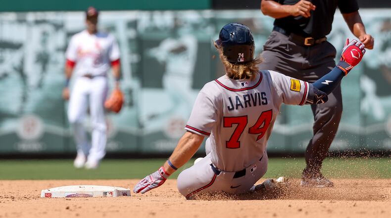 Atlanta Braves' Jim Jarvis (74) slides into second base after hitting a double during the sixth inning of a baseball game against the St. Louis Cardinals, Sunday, July 12, 2026, in St. Louis. (AP Photo/Scott Kane)