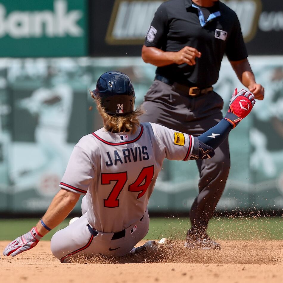Atlanta Braves' Jim Jarvis (74) slides into second base after hitting a double during the sixth inning of a baseball game against the St. Louis Cardinals, Sunday, July 12, 2026, in St. Louis. (AP Photo/Scott Kane)