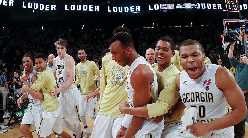 Georgia Tech players celebrate after defeating Notre Dame 62-60 in an NCAA college basketball game Saturday, Jan. 28, 2017, in Atlanta. (AP Photo/John Bazemore)