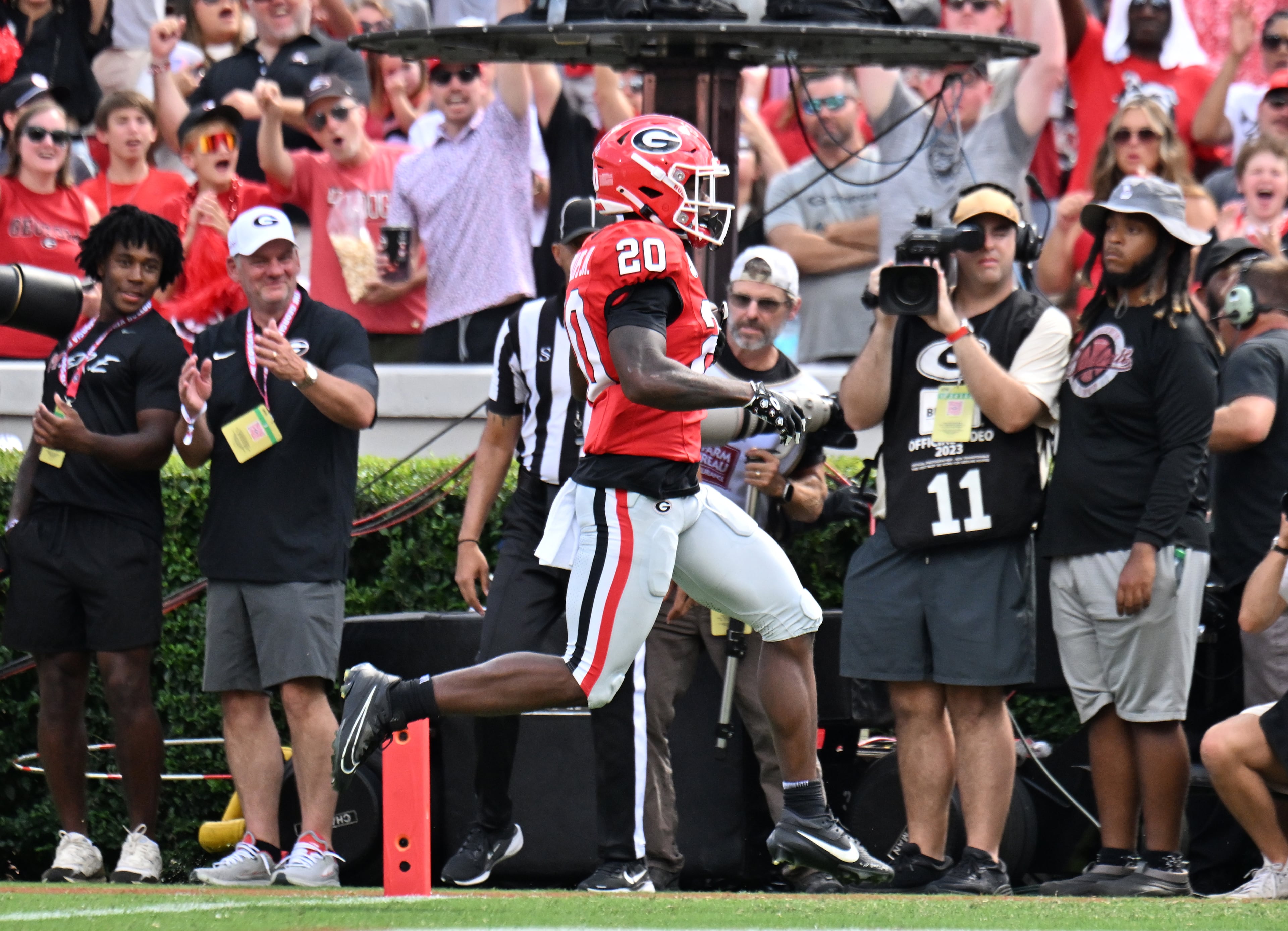 Georgia running back Dwight Phillips Jr (20) scores a touchdown during the first half in an NCAA football game at Sanford Stadium, Saturday, August 30, 2025, in Athens. (Hyosub Shin / AJC)