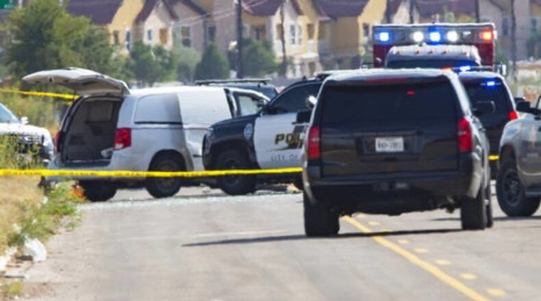 Odessa and Midland police and sheriff's deputies surrounded a white van in Odessa, Texas, on Saturday after reports of gunfire.