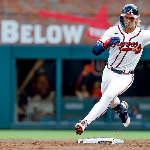 Atlanta Braves' Jim Jarvis rounds second base after hitting a two-run triple against the San Diego Padres during the second inning of a baseball game, Tuesday, July 21, 2026, in Atlanta. (AP Photo/Erik S. Lesser)