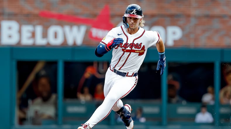 Atlanta Braves' Jim Jarvis rounds second base after hitting a two-run triple against the San Diego Padres during the second inning of a baseball game, Tuesday, July 21, 2026, in Atlanta. (AP Photo/Erik S. Lesser)