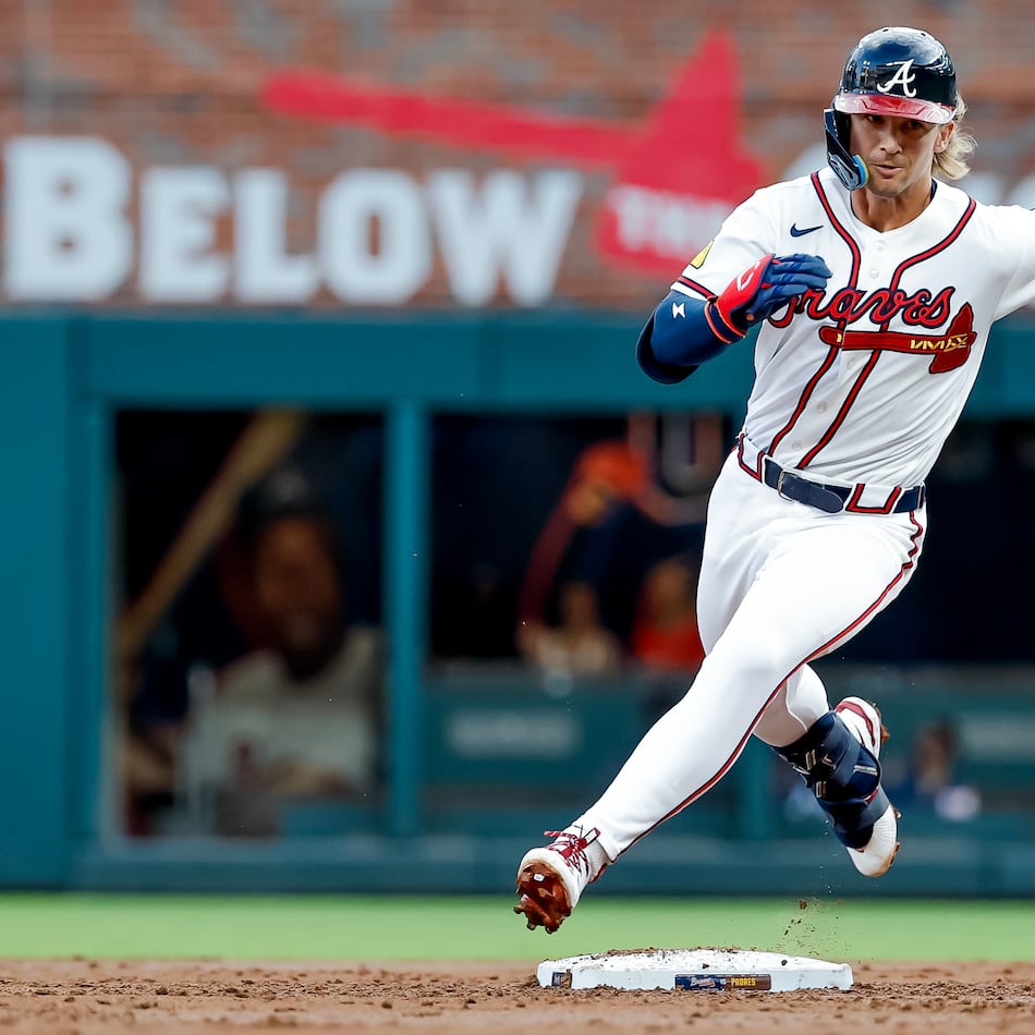Atlanta Braves' Jim Jarvis rounds second base after hitting a two-run triple against the San Diego Padres during the second inning of a baseball game, Tuesday, July 21, 2026, in Atlanta. (AP Photo/Erik S. Lesser)