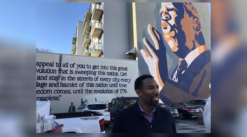 Atlanta City Councilman Andre Dickens speaks about Congressman John Lewis on Monday.