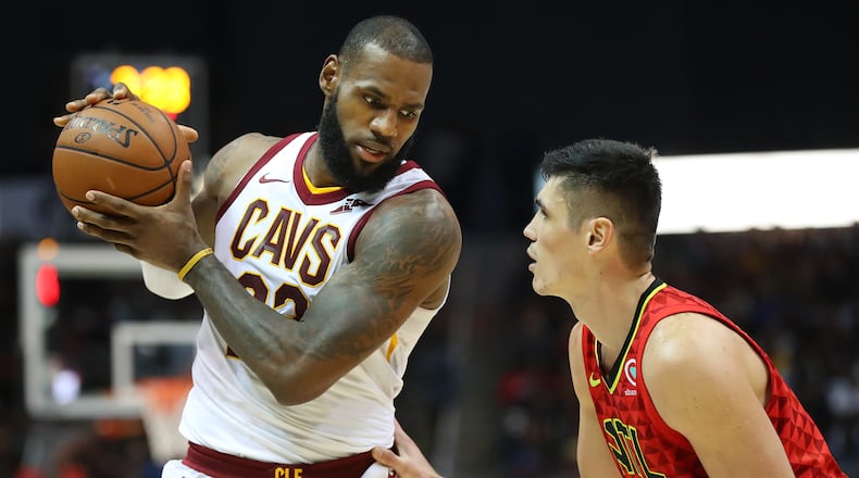 November 30, 2017 Atlanta: Cavaliers LeBron James works against Hawks Ersan Ilyasova during the second half in a NBA basketball game on Thursday, November 30, 2017, in Atlanta. Curtis Compton/ccompton@ajc.com