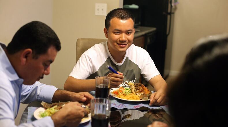 File Photo: Rigoberto Rivera, center, and his parents are venturing out of their home to clean houses amid the coronavirus pandemic so they can pay their bills. None of them have health insurance or paid sick leave and don’t have the option to work from home. JASON GETZ / JGETZ@AJC.COM