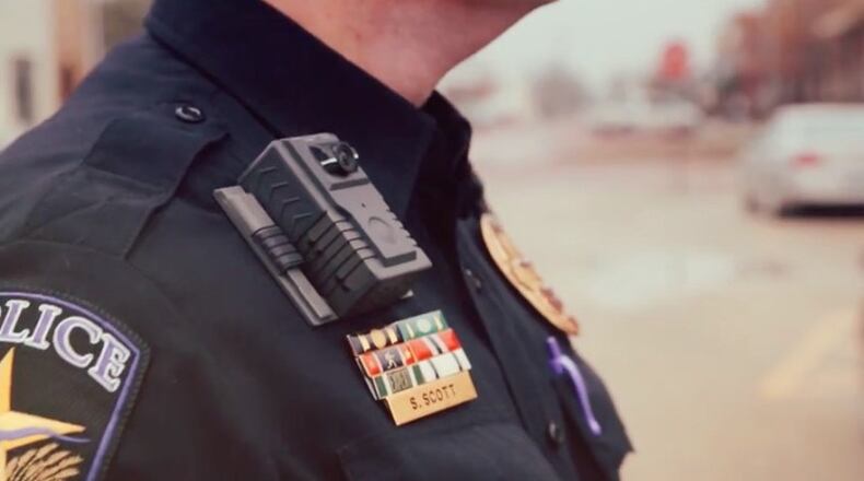 Cherokee County will spend $99,342 total over the next five years to outfit code enforcement and animal control officers and their vehicles with camera systems. AJC FILE