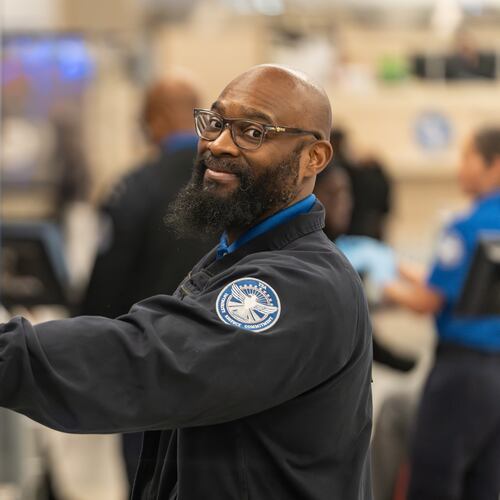 A TSA officer works the special assistance checkpoint at Hartsfield-Jackson Atlanta International Airport amid the partial government shutdown Monday, March 30, 2026. (Ben Hendren for the AJC)