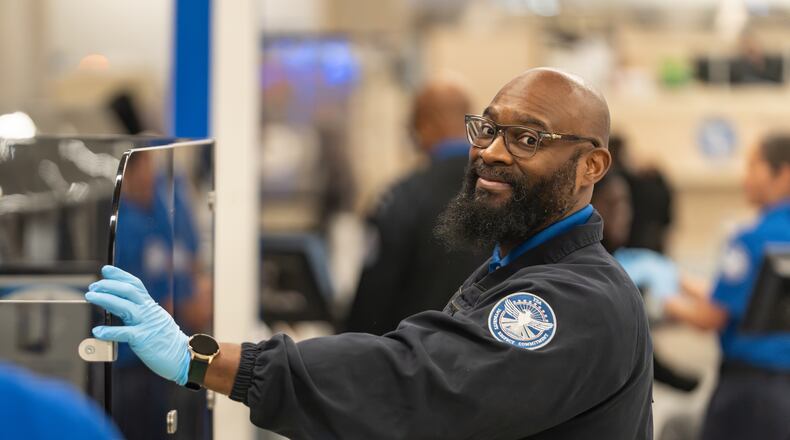 A TSA officer works the special assistance checkpoint at Hartsfield-Jackson Atlanta International Airport amid the ongoing partial government shutdown on Monday, March 30, 2026 (Ben Hendren for the AJC)