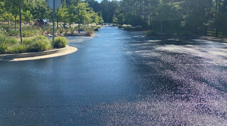 Milton recently approved and completed adding a high-density mineral bond surface treatment and new striping to the parking lot at Bell Memorial Park. COURTESY CITY OF MILTON