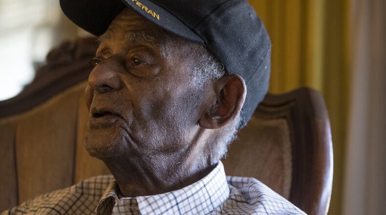 Private First Class Stephen Williams, 102, is shown during an interview at his home in Atlanta on Wednesday, Nov. 29, 2017. (CASEY SYKES, CASEY.SYKES@AJC.COM)