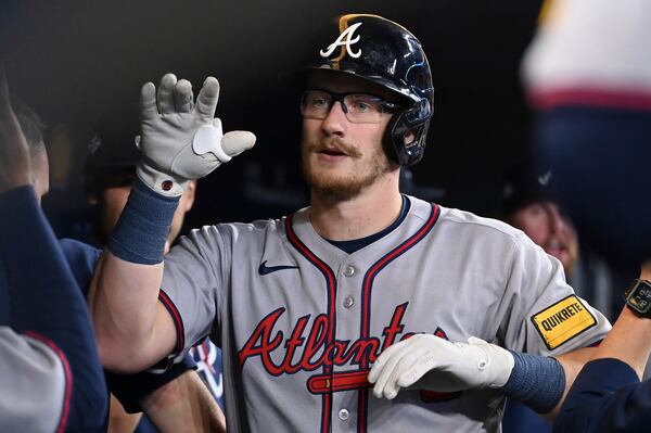 Atlanta Braves' Sean Murphy celebrates after hitting a two-run home run which also scored Matt Olson in first-inning baseball game action against the Toronto Blue Jays in Toronto, Monday, April 14, 2025. (on Blacker/The Canadian Press via AP)
