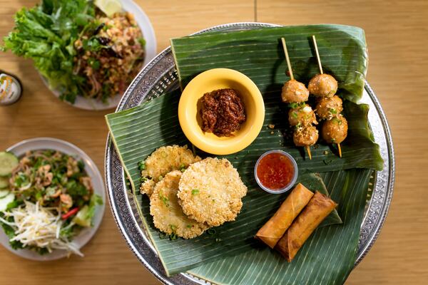 Snackboxe Bistro appetizer plate with egg rolls, Khao Chee, and meatballs. CONTRIBUTED BY MIA YAKEL