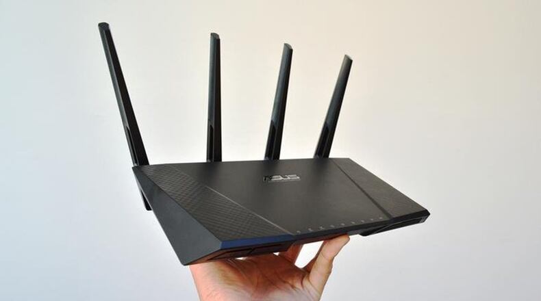 The Asus AC2400 RT-AC87U Dual-band Wireless Gigabit Router has superfast Wi-Fi speed and an extremely long range. (MCT)
