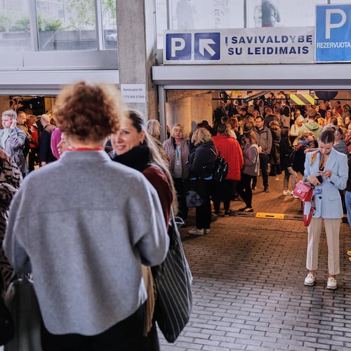 People take shelter in an underground car park during an air raid alert in Vilnius, Lithuania, Wednesday, May 20, 2026. (Vygintas Skaraitis/Lrytas via AP)