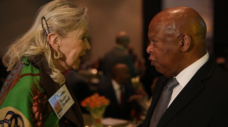 Amanda Brown Olmstead was among the many supporters greeting US Rep. John Lewis at the Monday Heritage celebration. Photo: Henry Taylor