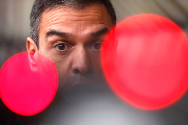 FILE- Spain's Prime Minister Pedro Sanchez speaks on camera as he arrives for an EU summit at the European Council building in Brussels, Oct. 1, 2020. (AP Photo/Francisco Seco, File)