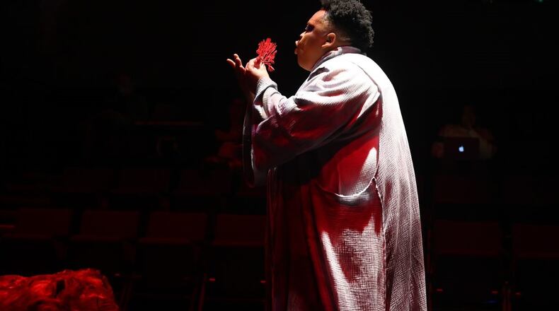 Trevor Perry appears in “Transmissions in Advance of the Second Great Dying,” continuing through Sunday with Theater Emory.
(Courtesy of Theater Emory/Becky Stein)