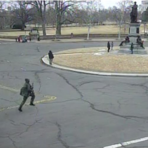This image from video contained in the Justice Department's memorandum in support of pretrial detention of Carter Camacho, 18, shows Camacho running near the U.S. Capitol in Washington, Feb. 17, 2026. (Justice Department via AP)