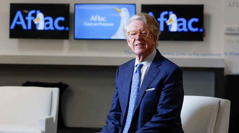 Aflac CEO Dan Amos — pictured posing for a photograph at the company’s headquarters in Columbus in November — is now the longest-serving CEO of a Fortune 250 company following Warren Buffett’s retirement from Berkshire Hathaway. (Miguel Martinez/AJC)