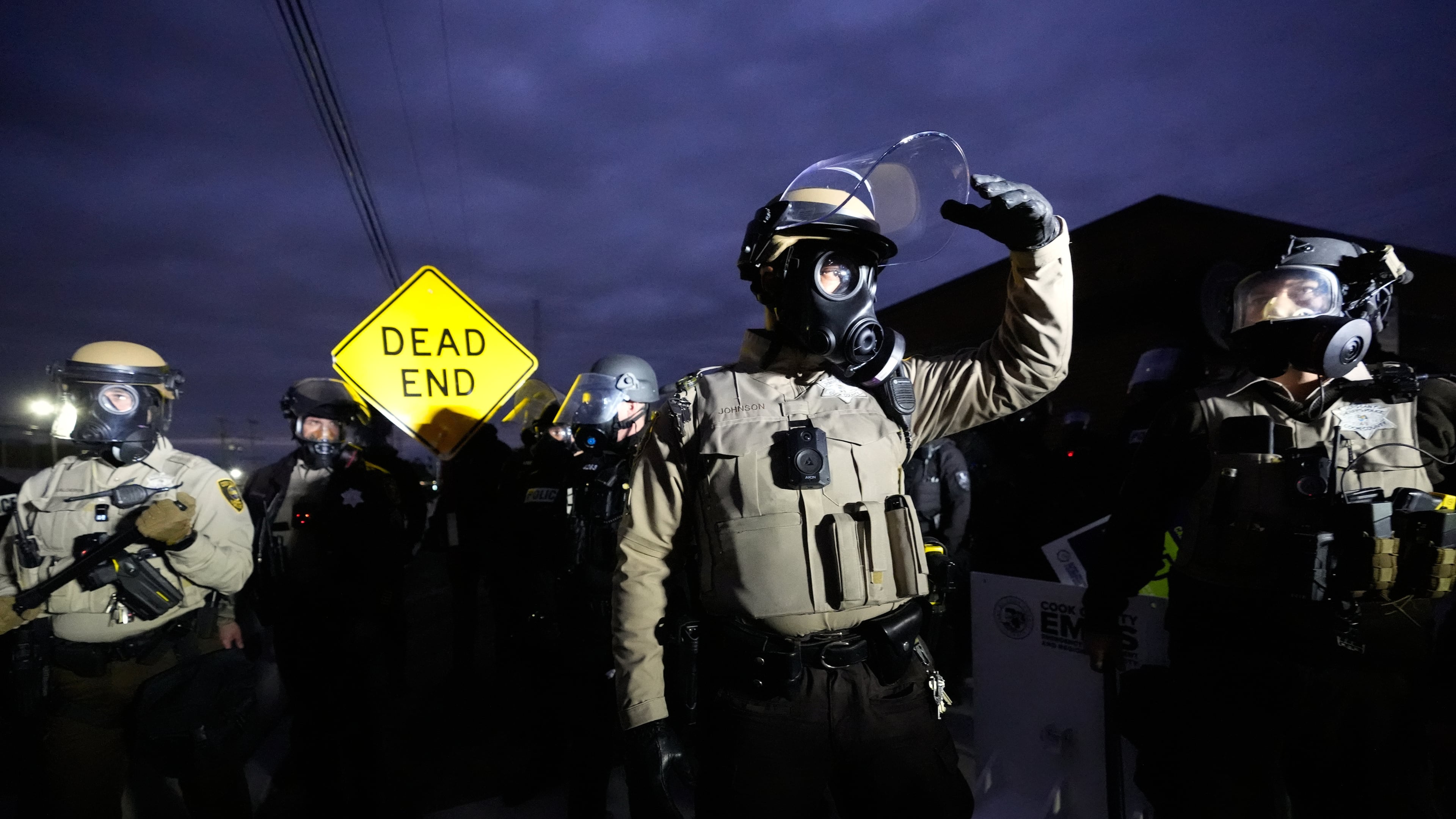 Law enforcement standoff with protesters outside an ICE processing facility in the Chicago suburb of Broadview, Ill., Saturday, Nov. 1, 2025. (AP Photo/Alex Brandon)