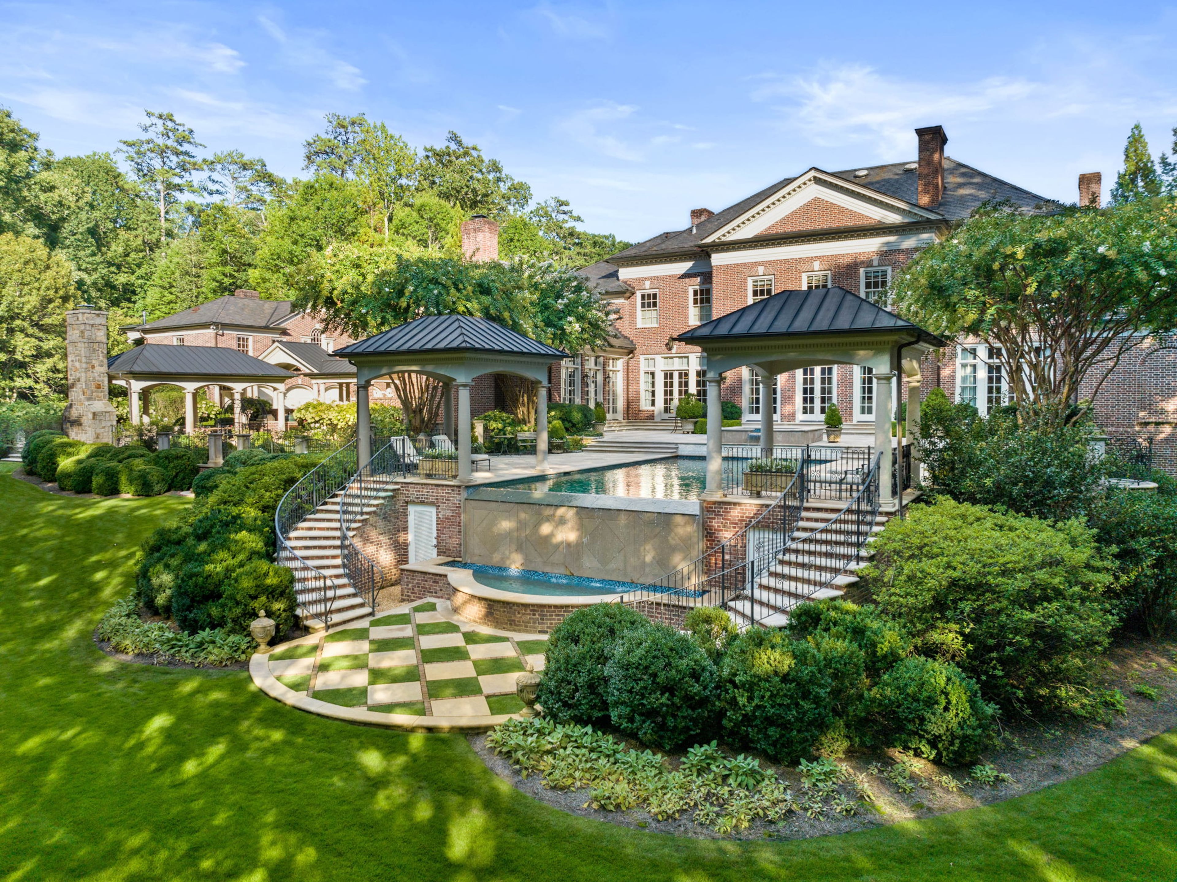 Sold for $12,865,000, the Buckhead property features over 14,000 square feet of living space in the main house alone.