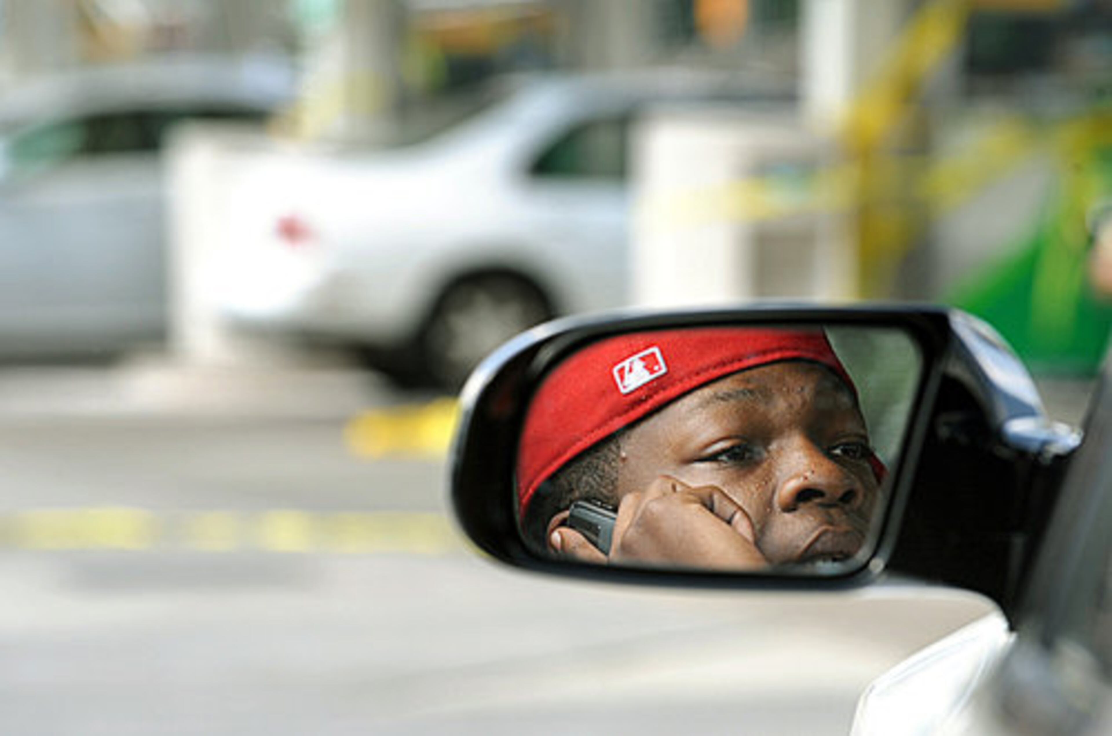 Sept. 2008 -- Shin Thomson of Chicago passed the time on the telephone while waiting in line. The current 2016 gas shortage has Georgia officials worried at the prospect that the spotty outages that started over the weekend could start to affect business and government operations if the problem worsens.