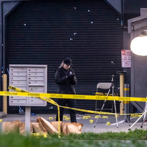 Investigators with the San Joaquin Sheriff's Department collect evidence at the site of Saturday's shooting at a banquet hall in Stockton, Calif., Sunday, Nov. 30, 2025. (Carlos Avila Gonzalez/San Francisco Chronicle via AP)
