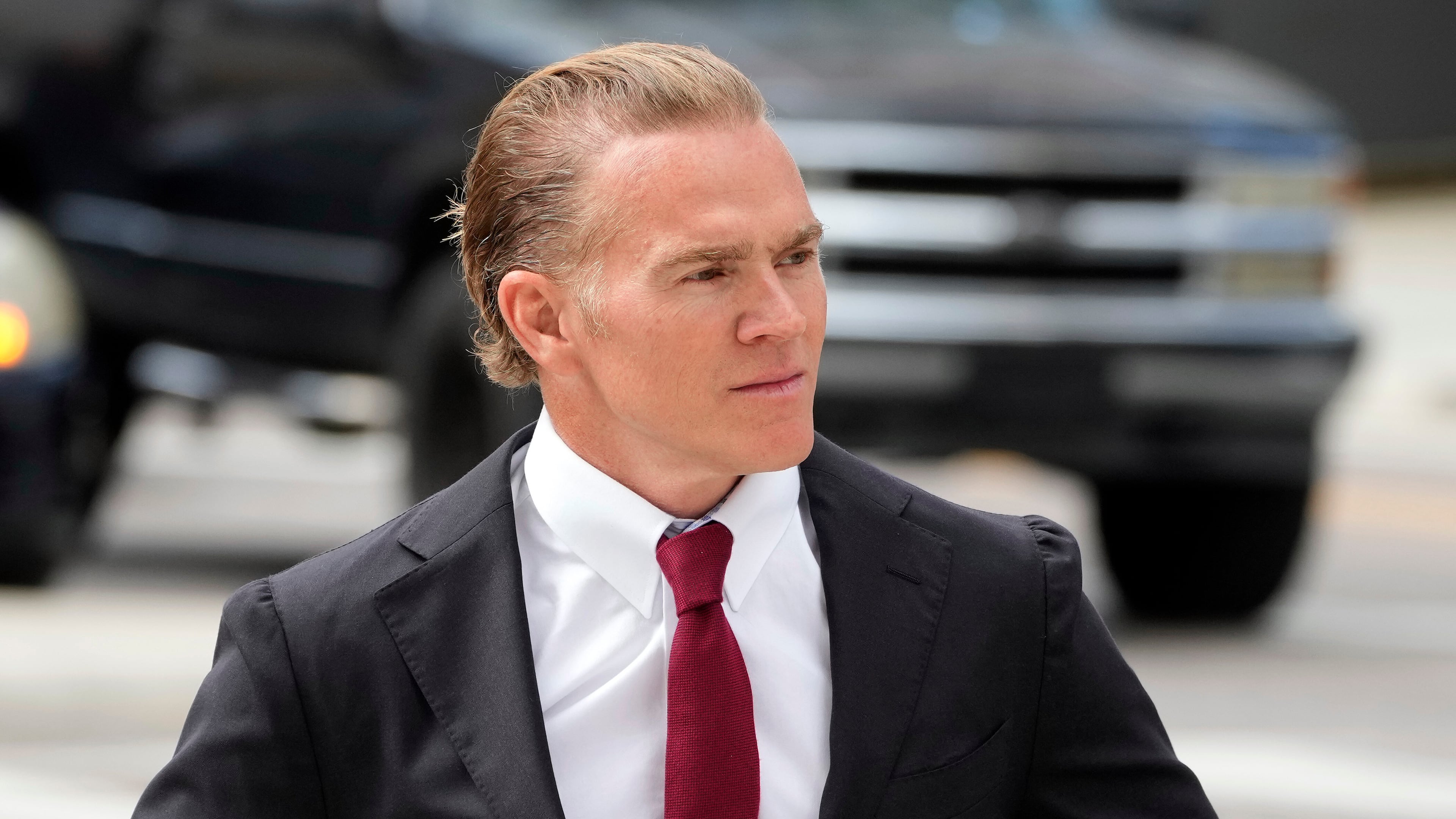 Former Green Beret Jordan Goudreau walks to the United States Courthouse for a bond hearing in Tampa, Fla., Wednesday, Oct. 29, 2025.  (AP Photo/Chris O'Meara)