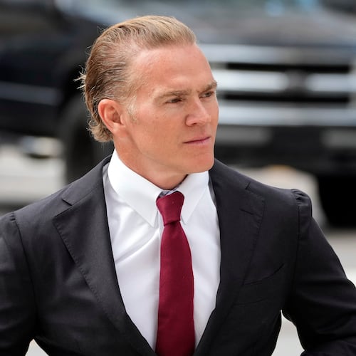 Former Green Beret Jordan Goudreau walks to the United States Courthouse for a bond hearing in Tampa, Fla., Wednesday, Oct. 29, 2025.  (AP Photo/Chris O'Meara)