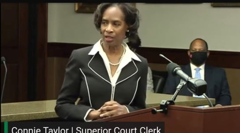 Cobb Superior Court Clerk Connie Taylor, being sworn in following her 2020 election victory and before making a bunch of money off passport application fees.