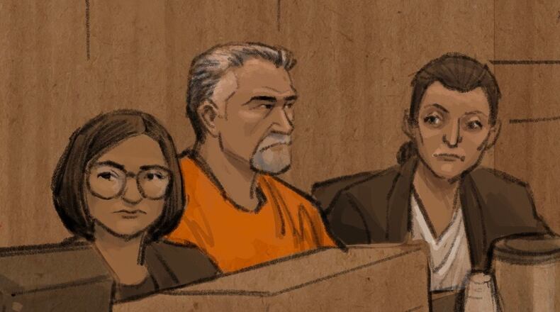 In this courtroom sketch, Vance Boelter, center, listens during his sentencing hearing on Thursday, July 23, 2026, in Minneapolis. (Cedric Hohnstadt via AP)
