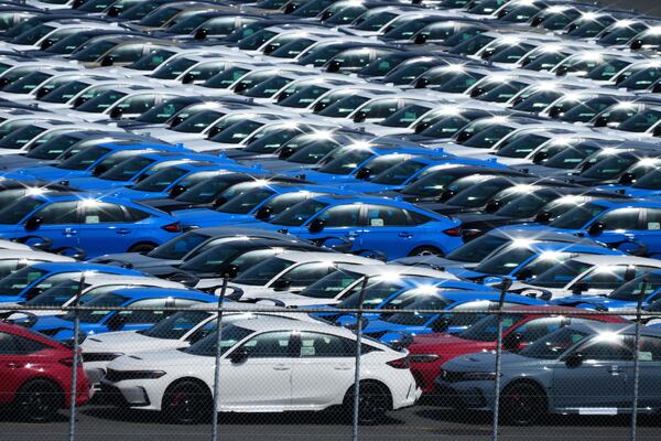 Export vehicles are parked at Daikoku Pier in Yokohama, near Tokyo, Tuesday, April 8, 2025. (AP Photo/Hiro Komae)