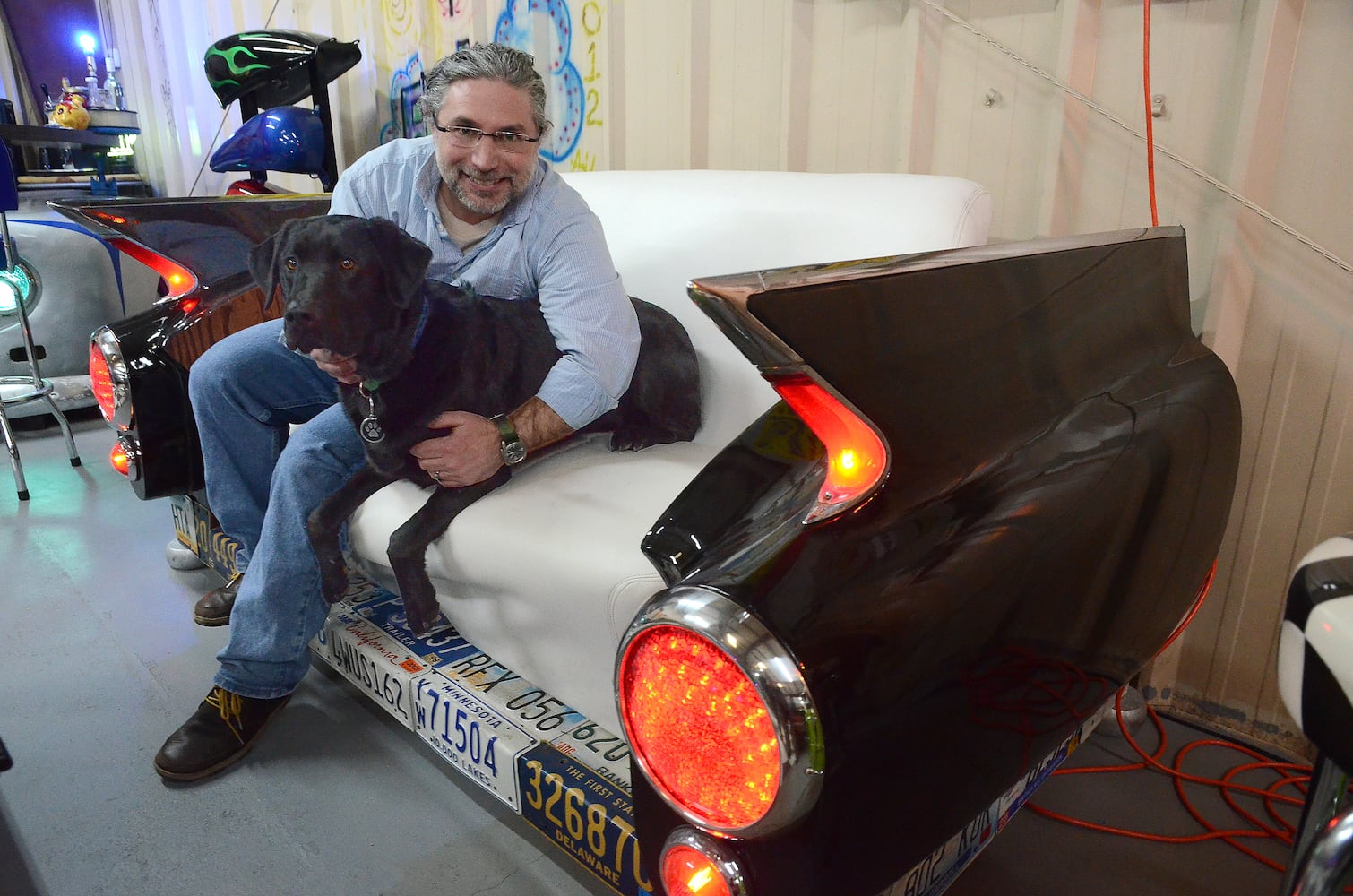 Black Lab Automotive's one-of-a-kind furniture made from classic car parts is likely to create buzz at this year's Atlanta International Auto Show.