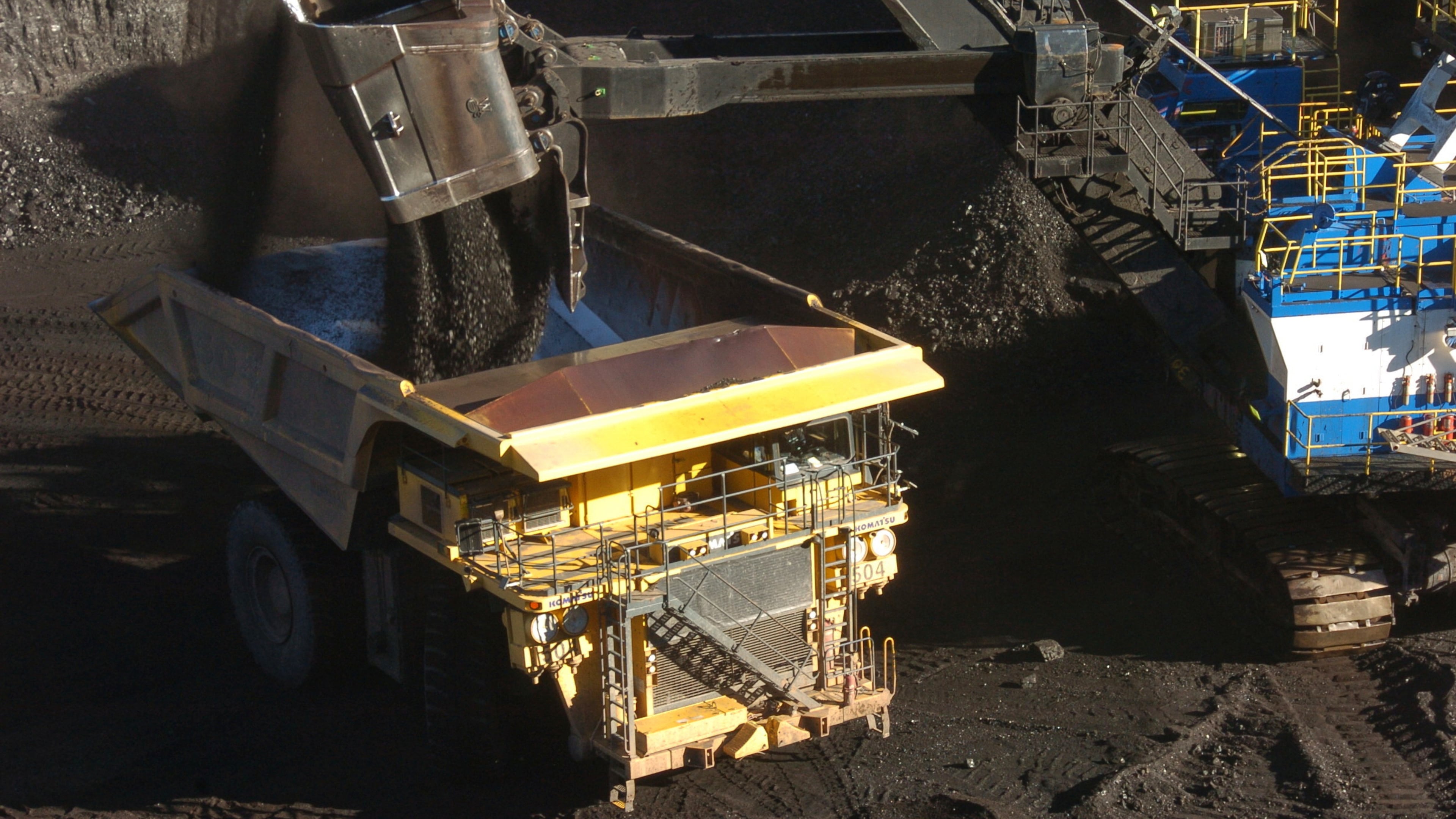 FILE - A mechanized shovel loads coal into a haul truck at a mine near Decker, Mont., on Nov. 15, 2016. (AP Photo/Matthew Brown, File)