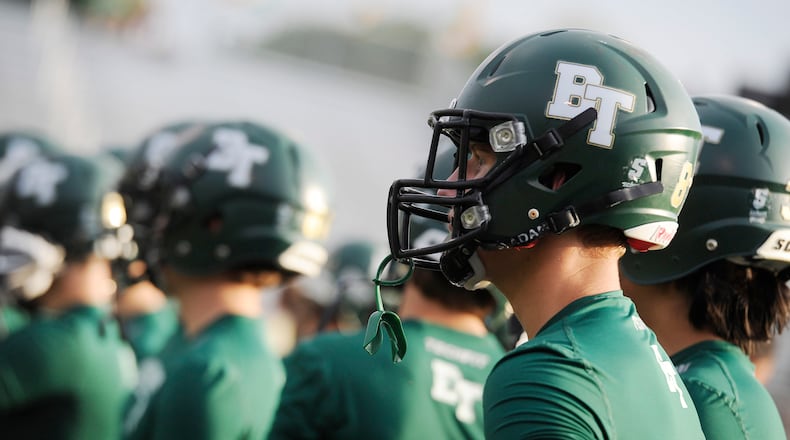Blessed Trinity players warm up before a game in 2015.