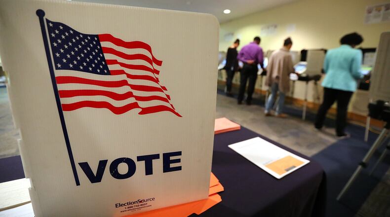 Early voters cast their ballots at the Buckhead Library in November. Curtis Compton/ccompton@ajc.com