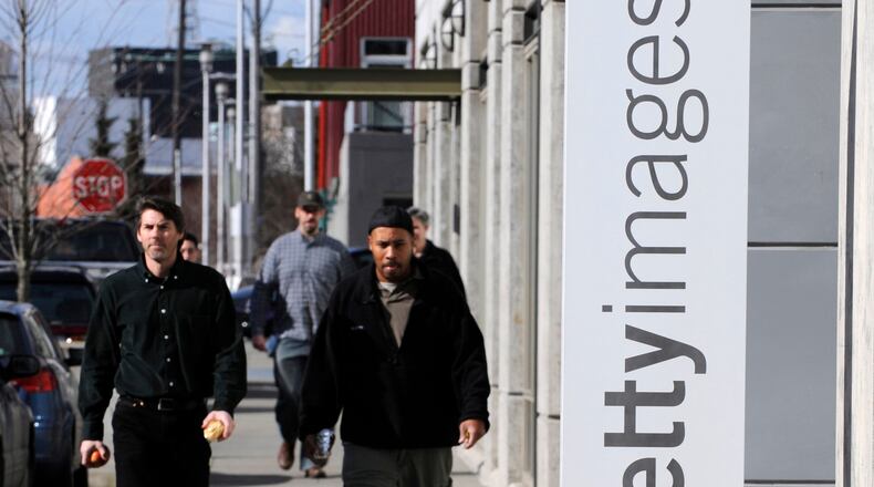 FILE - A sign for the Seattle office of Getty Images Inc., is shown Monday, Feb. 25, 2008, in Seattle. (AP Photo/Ted S. Warren, File)
