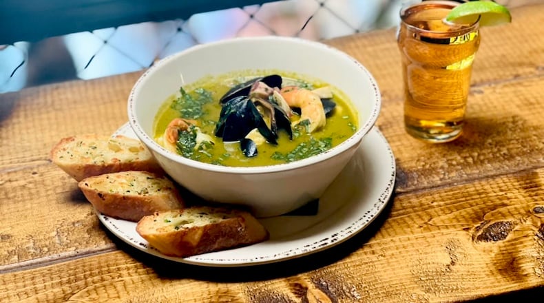 A bowl of caldo verde de marisco, served with crispy crostini, makes a hearty meal at Boho115. Courtesy of Boho115