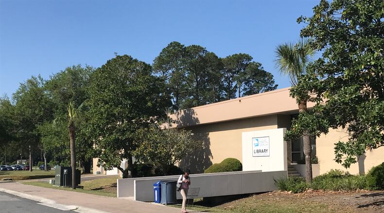 A student leaves the College of Coastal Georgia library on Tuesday, April 18, 2017. The Georgia Board of Regents met on the campus Tuesday and voted to increase tuition at its schools for the fall 2017 semester. ERIC STIRGUS/ESTIRGUS@AJC.COM