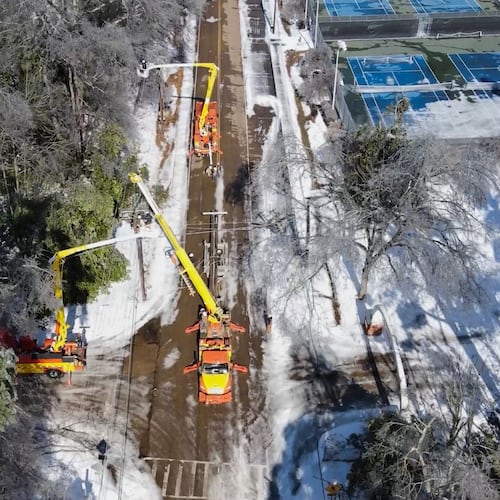 This image taken from a video released by the city of Oxford, Miss., shows crews working on power lines Tuesday, Jan. 27, 2026. (City of Oxford Mississippi via AP)