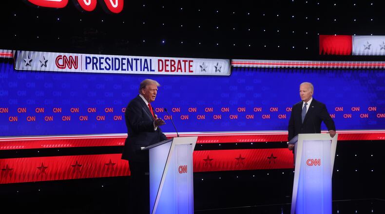 President Joe Biden and former President Donald Trump face off during their first presidential debate at CNN, Thursday, June 27, 2024, in Atlanta. (Jason Getz / AJC)
