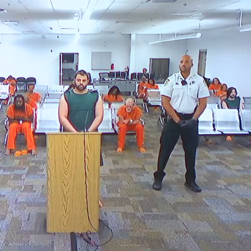 Hisham Abugharbieh, facing two counts of first-degree murder appears in court via video on Saturday, April 25, 2026 in Tampa, Fla. (WFTS-TV via AP)