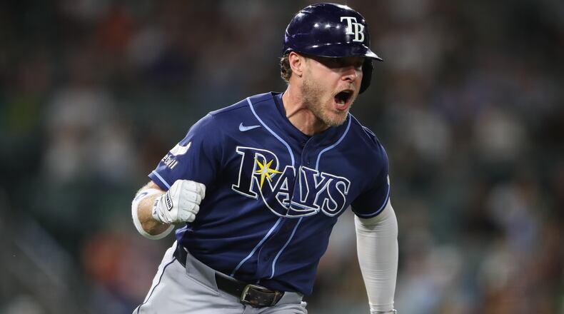 Tampa Bay Rays' Taylor Walls reacts as he heads towards first base on a two RBI single during the eighth inning of a baseball game against the Athletics Monday, Aug. 10, 2026, in West Sacramento, Calif. (AP Photo/Scott Marshall)