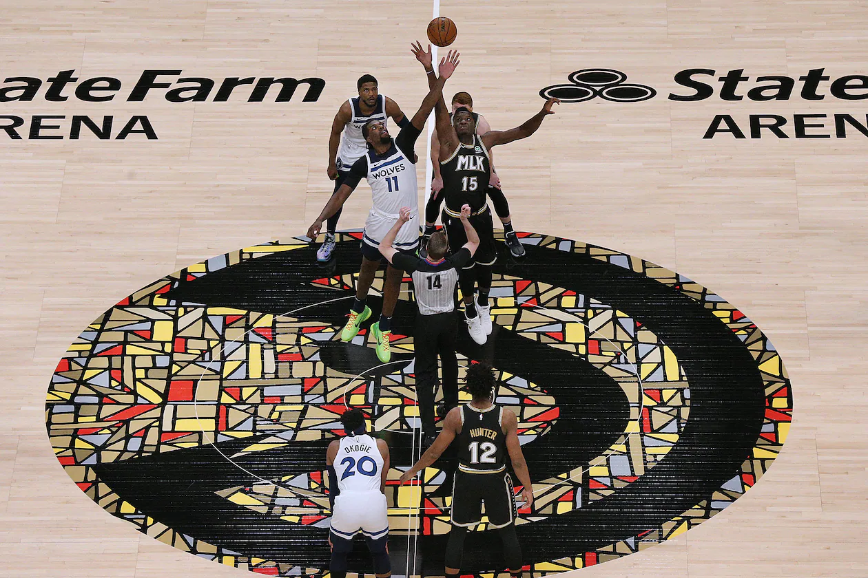 The Hawks and Timberwolves tip off their Martin Luther King Jr. Day game on Jan. 18, 2021, at State Farm Arena in Atlanta. With Atlanta being King's hometown, the Hawks further honored the civil rights icon as the first NBA team to wear a jersey featuring the letters “MLK.” (Curtis Compton/AJC 2021)