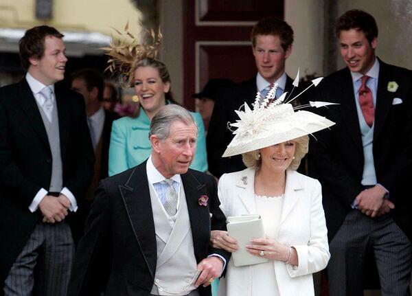 FILE - Britain's Prince Charles, and Camilla, Duchess of Cornwall, leave the Guildhall, Windsor, Saturday, April 9, 2005, following their civil wedding ceremony. (Peter Tarry, Pool Photo via AP, File)
