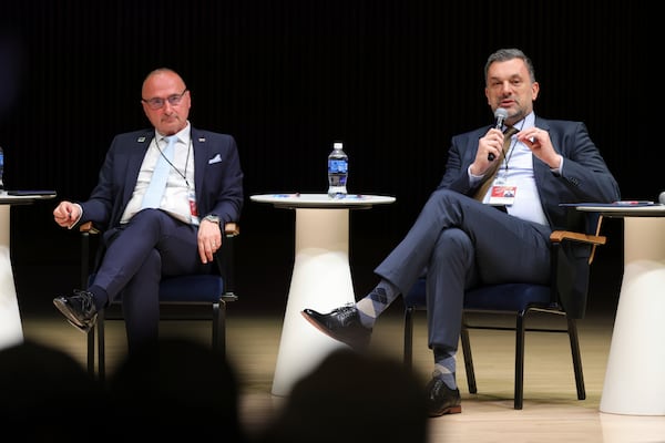 Minister of Foreign Affairs of Bosnia and Herzegovina Elmedin Konakovic, right, speaks next to Minister of Foreign and European Affairs of Croatia Gordan Grlic-Radman during a panel discussion at the NATO Parliamentary Assembly in Dayton, Ohio, Friday, May 23, 2025. (AP Photo/Paul Vernon)